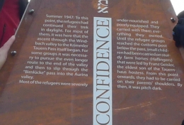 Confidence memorial sign - where refugees were waiting to continue in the darkness