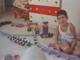 At 5 years of age, with train set 182, train station set 148 and my original tower