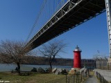 Red Little Lighthouse on Hudson River and Washington Bridge